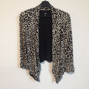 Leopard draped sweater with structured shoulders